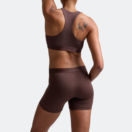 Alena wears a size S