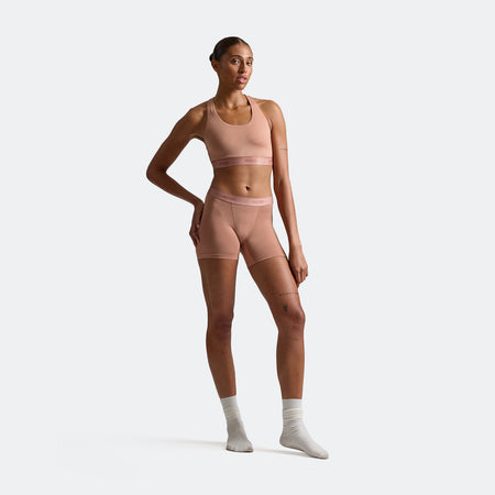 Alena wears a size S