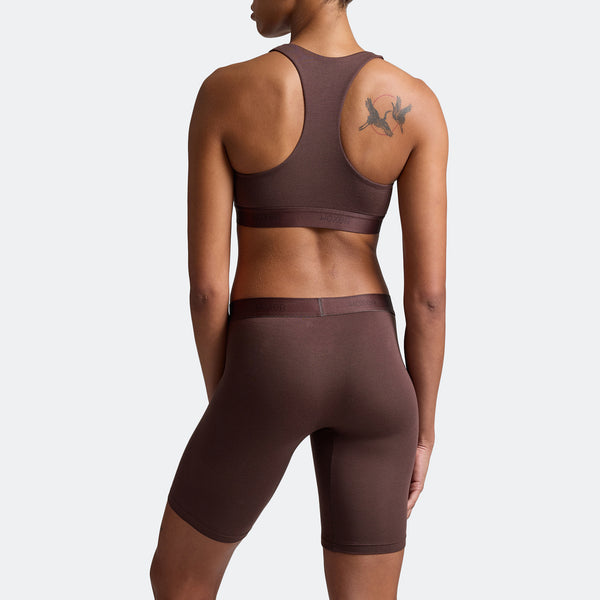 Alena wears a size S