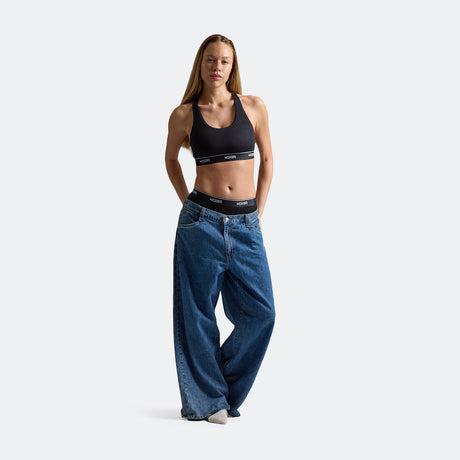 Sam wears a size M