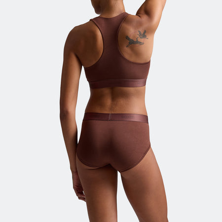 Alena wears a size S