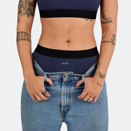Tay wears a size M