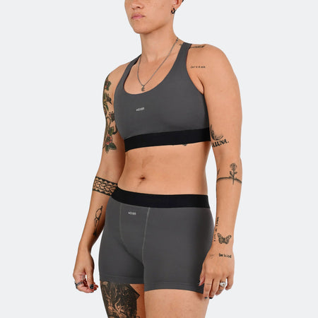Tay wears a size M
