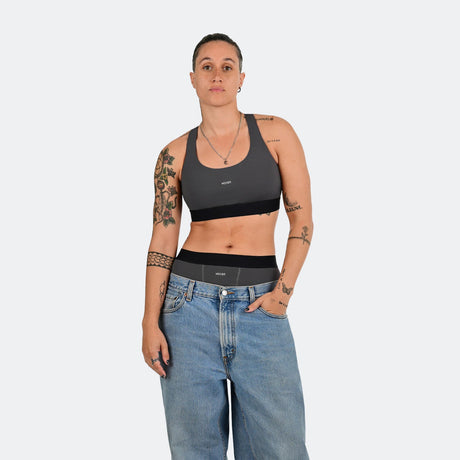Tay wears a size M