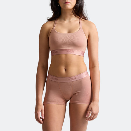 Maya wears a size S