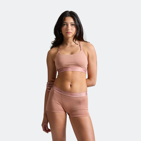 Maya wears a size S