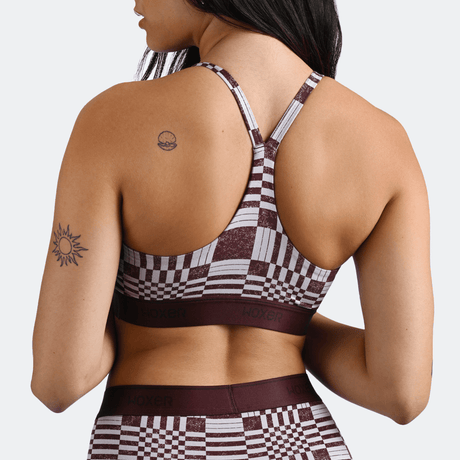 Maya wears a size S