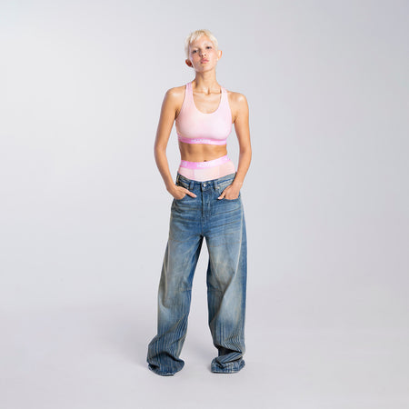 Sofia wears a size S