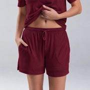 Sam wears a size M