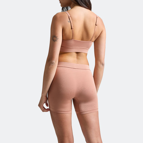 Maya wears a size S