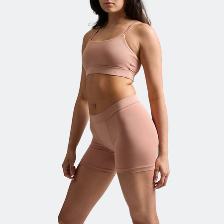 Maya wears a size S