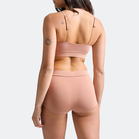 Maya wears a size S