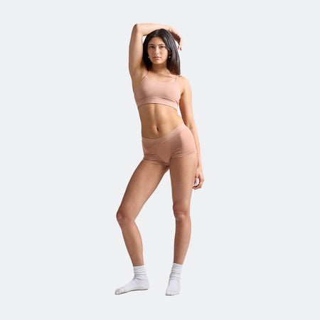 Maya wears a size S