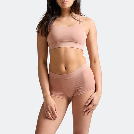 Maya wears a size S