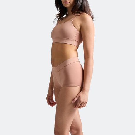 Maya wears a size S
