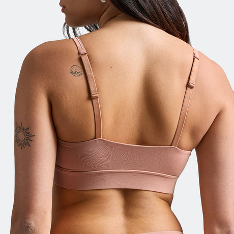 Maya wears a size S