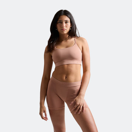 Maya wears a size S