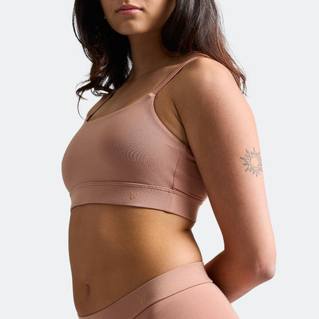 Maya wears a size S