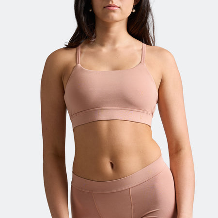 Maya wears a size S