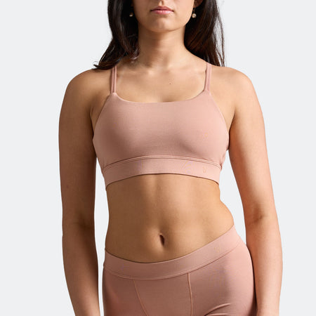 Maya wears a size S
