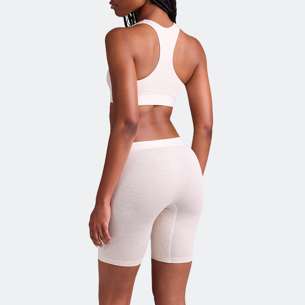 Maelyn wears a size M