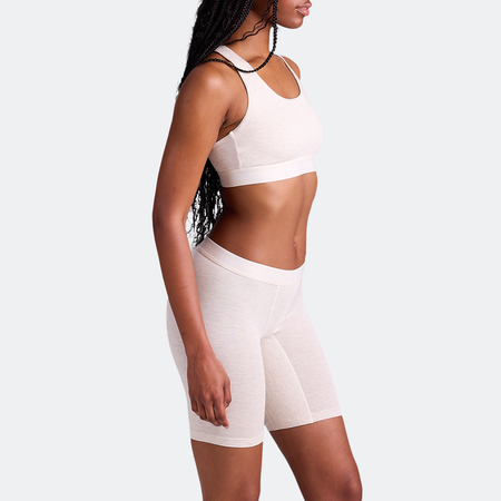 Maelyn wears a size M