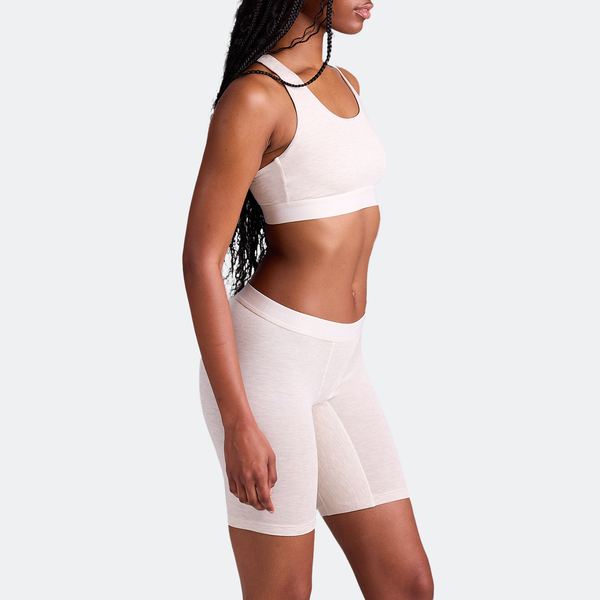 Maelyn wears a size M