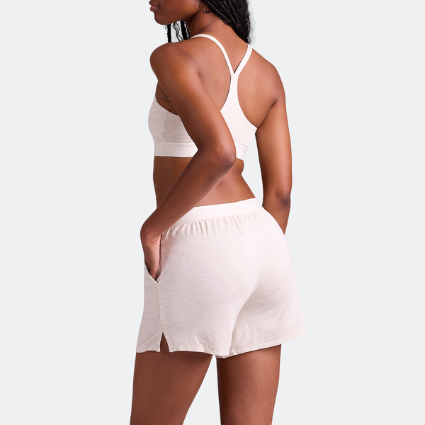 Maelyn wears a size M