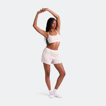 Maelyn wears a size M