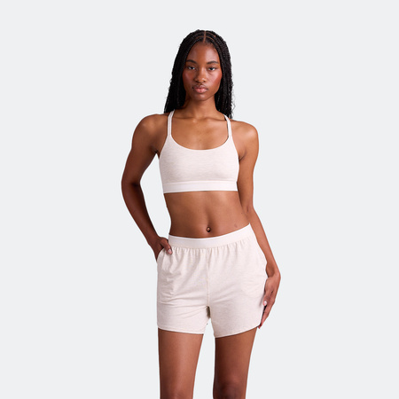 Maelyn wears a size M