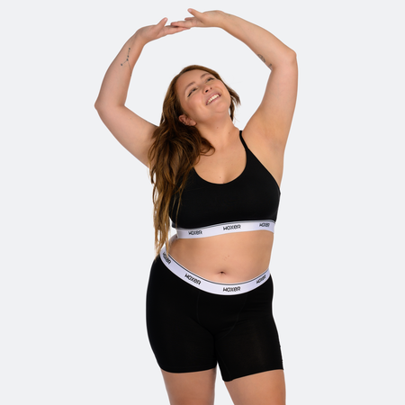 Trini wears a size XL